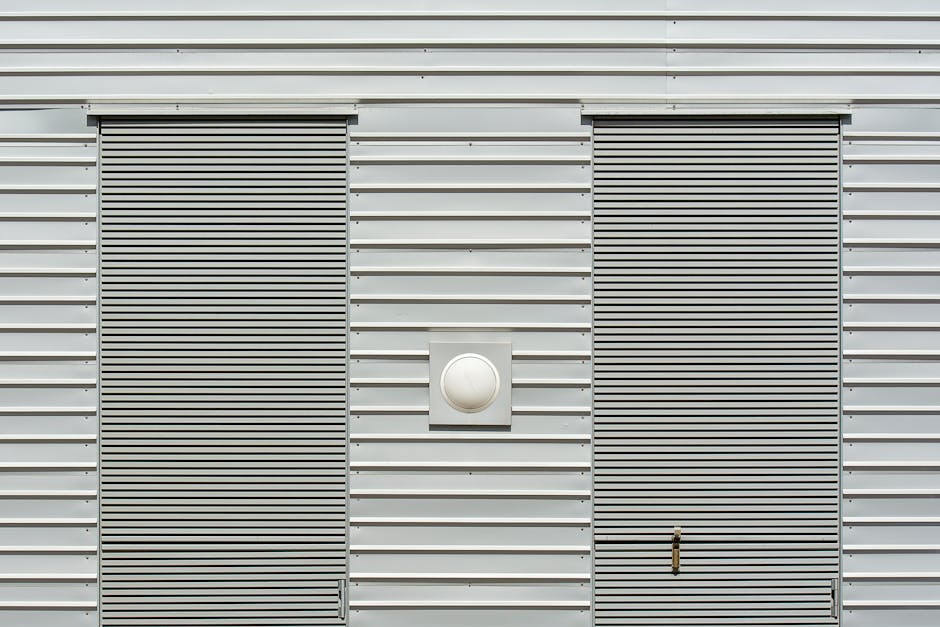 Professional vinyl siding installation on modern home
